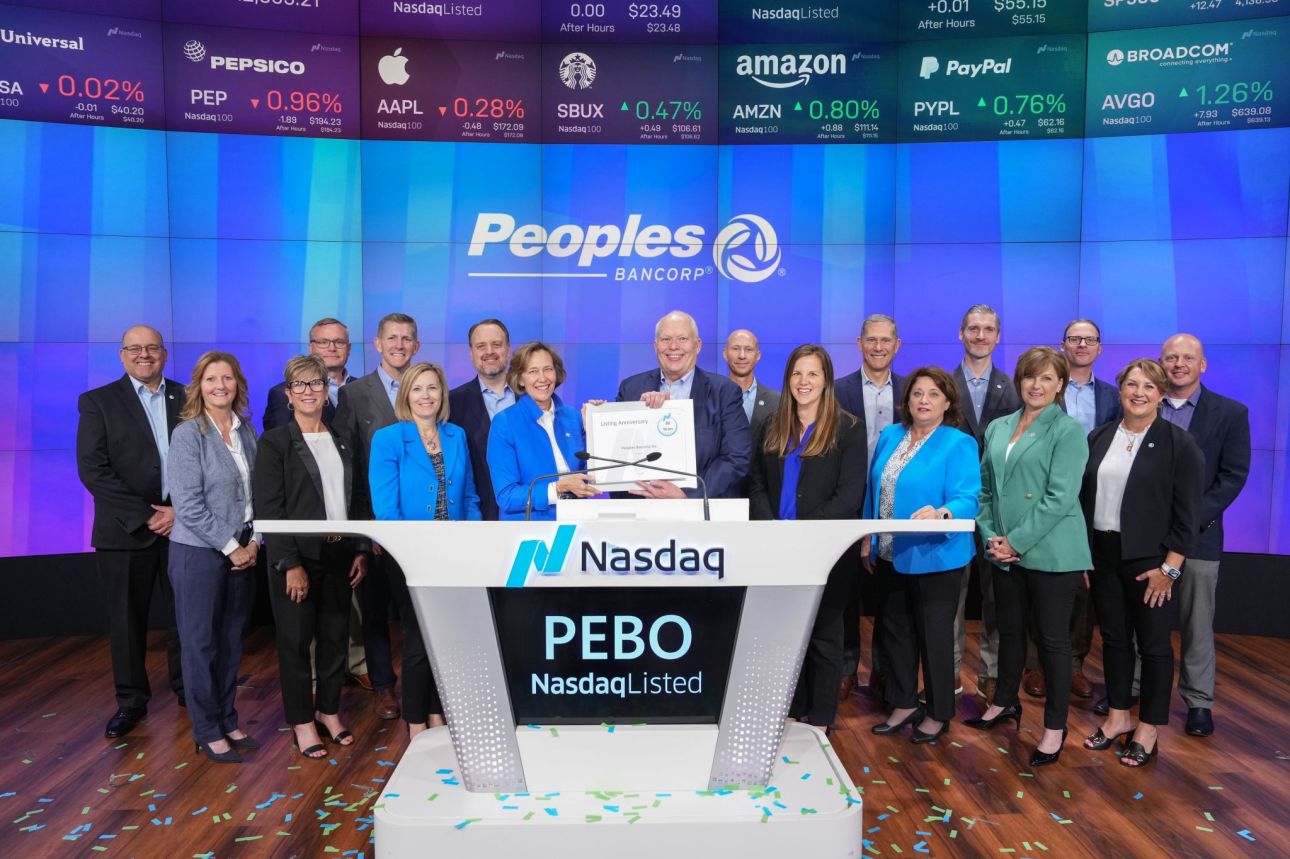 Peoples Bank associates ring the NASDAQ Bell.